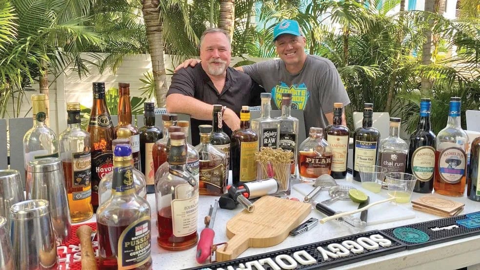 Relaxing Key West boat rentals scene with friends enjoying cocktails and tropical surroundings, perfect for exploring the Florida Keys by boat.